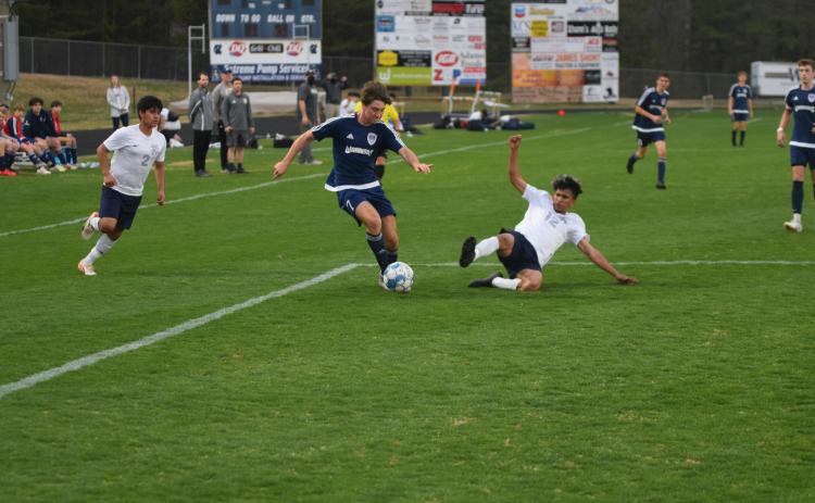 WCHS senior striker Hayden Gensler, right, is the Region 7-AAA Boy's Player of the Year. (Photos/Mark Turner)