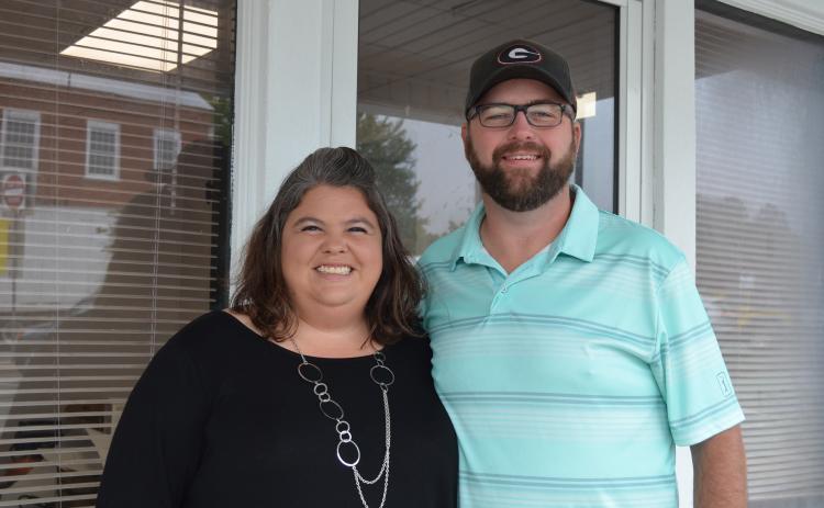 Pictured are Jessica and Ben Dollins in front of Mountain View Nutrition. (Photo/Stephanie Hill)