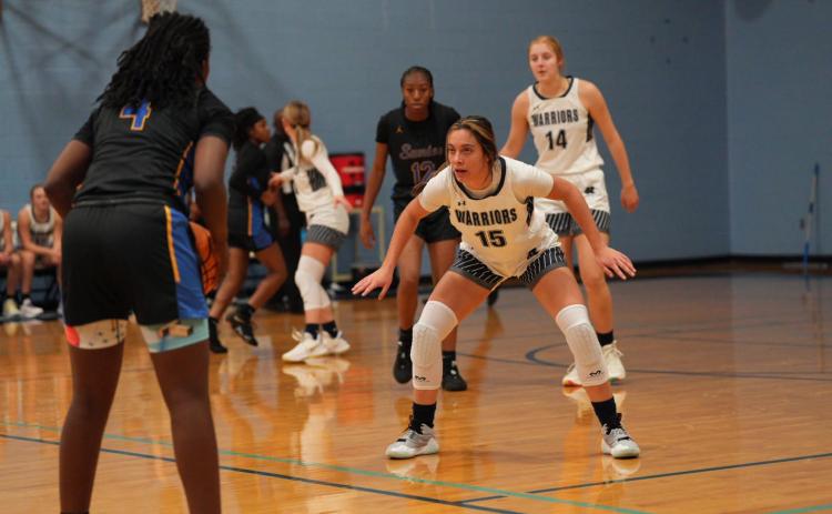 Naomi Roberts defends during the opening round win over Sumter, S.C. (Photo/Hilton Head HS Athletics)