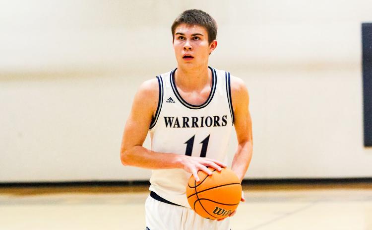 Noah Futch had 12 points in the opening quarter of the Warriors' win over Lumpkin County. (Photo/Staci Sulhoff)
