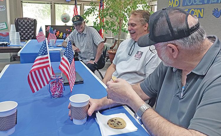 George Shipley, Randy Summers and Gary Leeds swap stories over refreshments. (Photo/Jessica Wood)