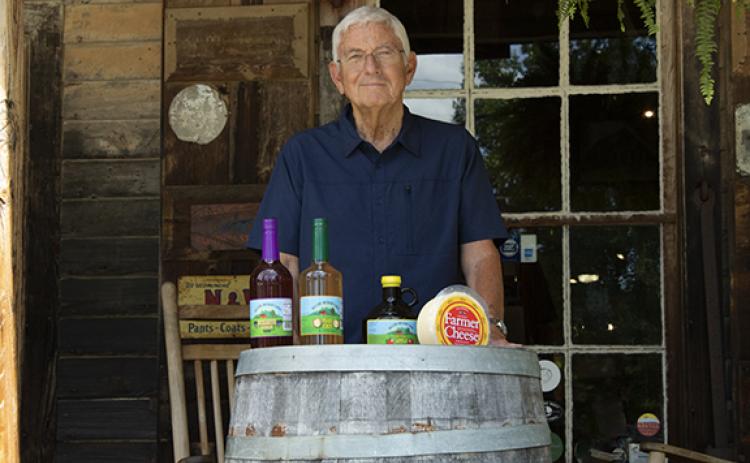 Bill Coen is commonly seen nowadays serving samples of cider outside of Old Sautee Store and sharing a happy tune. (Photo/Noah Johnson)