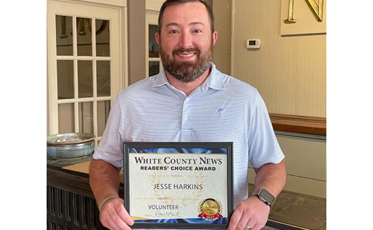 Jesse Harkins receives the 2023 Best Volunteer award.