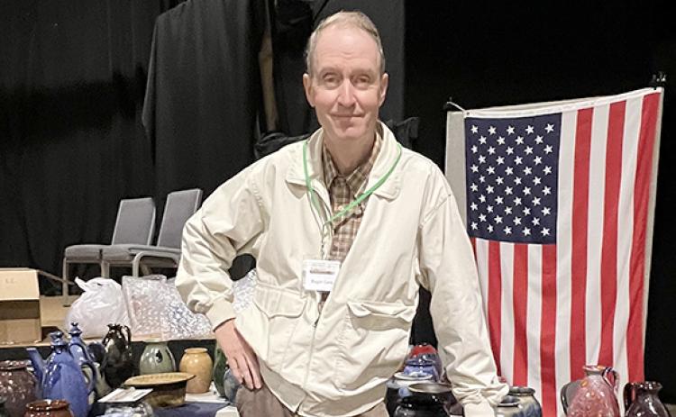 Roger Corn enjoys meeting people at last year’s Folk Pottery Show and Arts Festival. (file photo)