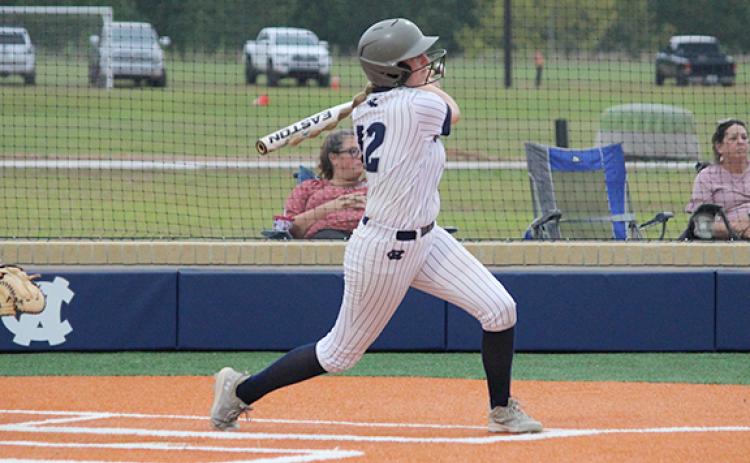 Valerie Bailey rips a walk off single Monday afternoon to end the Lady Warriors' 10-2 win over Lumpkin County. (Photos/Mark Turner)