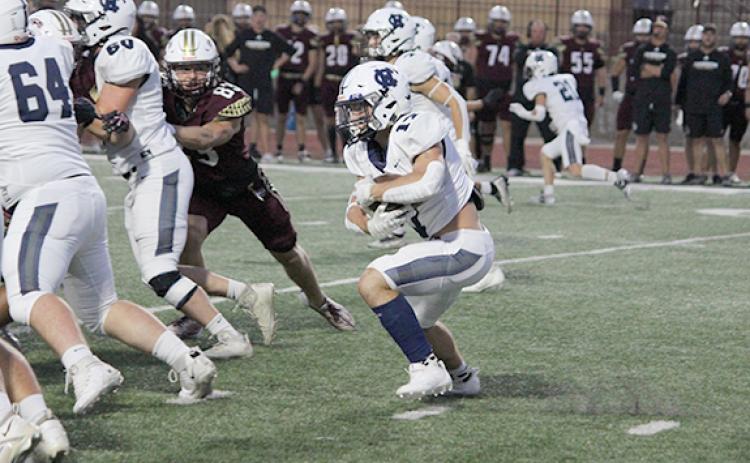 Ryan Fowler rushed for 203 yards and had two  touchdowns in the Warriors' region win over Dawson County.  (Photo/Mark Turner)