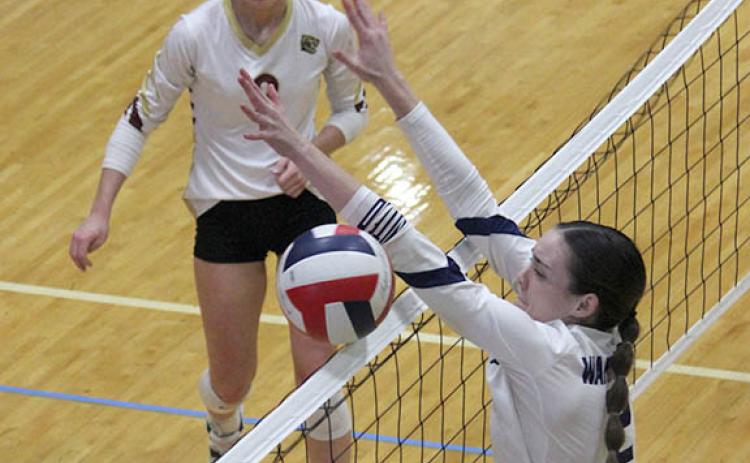 Sarah Blair blocks a shot during the 7-AAA tournament last week at WCHS. (Photo/Mark Turner)