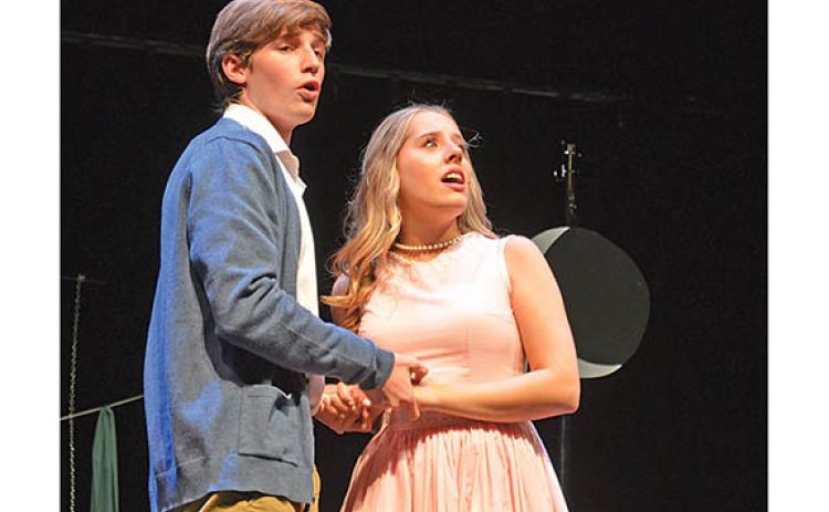 Sebastian Wiley and Nealy Webster sing “Soon It’s Gonna Rain” as Matt and Luisa in ‘The Fantasticks.’ (Photo/Samantha Sinclair)