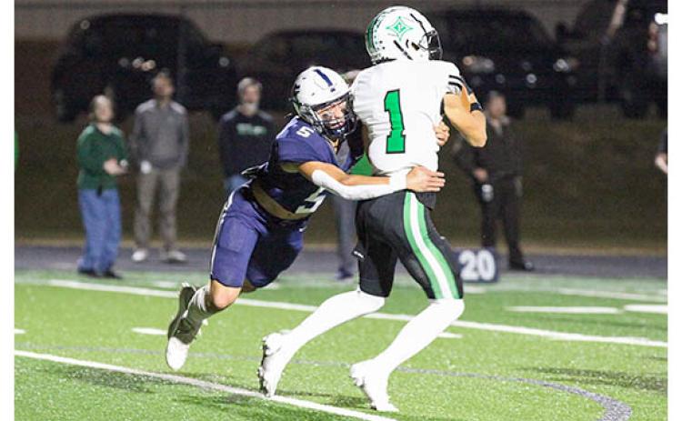 WCHS linebacker Jon Scott, left, brings down Pickens' McCord Purdy during the first half. (Photo/Staci Sulhoff)