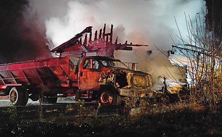 A truck sits after the flames were extinguished by firefighters at Holiness Campground Road. (Photo/submitted)
