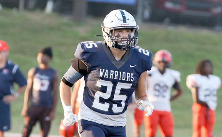 Bryce Dockery, above, and the Warriors will play East Hall in a spring game in May. (Photo/Staci Sulhoff)
