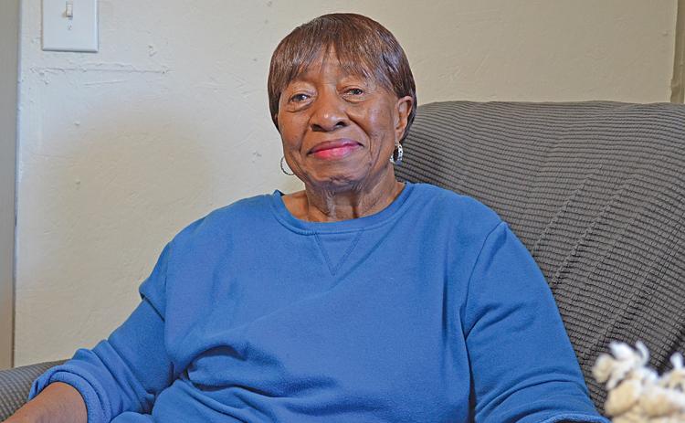 Betty Jenkins sits in the home her husband built in the Bean Creek community. (Photo/Samantha Sinclair)
