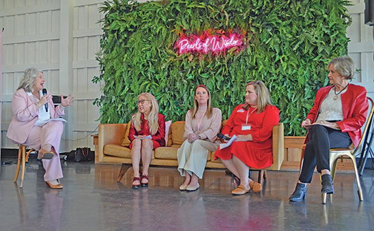 Panelists Margaret McLean, Dr. Shanda Ginn, Lacy Turner and Carol Jackson consider their answers as Moderator Beth Truelove asks a question during the Pearls of Wisdom panel discussion. (Photo/Samantha Sinclair)