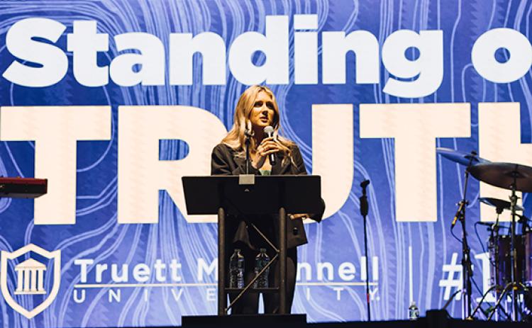 Riley Gaines speaks to crowd gathered at Truett McConnell University’s main event for Friends and Family Weekend. (Photo/Truett McConnell University)
