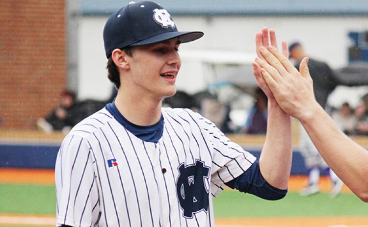 Trevor Butler had four hits and scored four runs at the plate and tossed a complete game in the Warriors' 18-4 win Monday over West Hall. (Photo/Mark Turner)