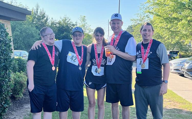 Members of the White County Special Olympics team are from left, Josiah Abernathy, Nathan Anderson, CJ McGuire, Carter Cruce and Roddy Edge. (Photo/Shena Anderson)
