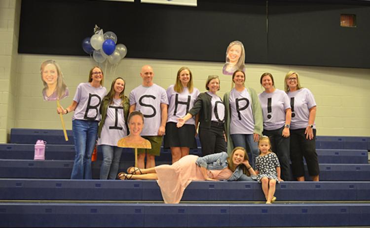 Teacher of the Year Caroline Bishop (with Gwen Bishop) poses in front of her personal cheering squad — Jodie Watkins, Shanna Walker, Chris Jenkins, Misty Burton, Millie Edwards, Paige Everett, Kensley Vandiver and Tina Vandiver — prior to the ceremony. (Photo/Samantha Sinclair)