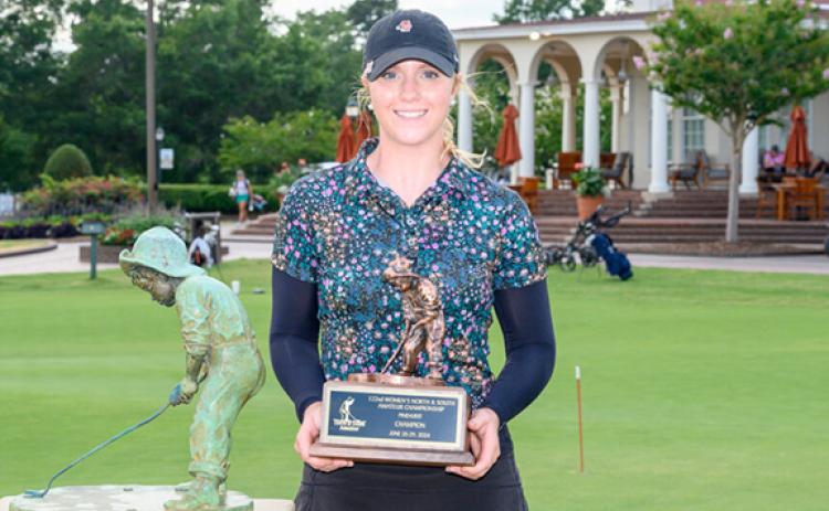 WCHS graduate Catie Craig shows off  the Putter Boy trophy after winning the North & South Amateur title in June. (Photo/Sandi Craig and Pinehurst.com)