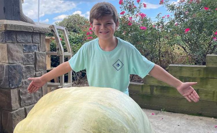 Drew Eason poses with his state champion pumpkin. (Photo/submitted)