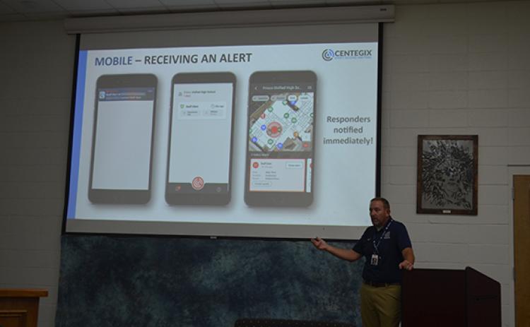 Dr. Jonathan Stripling presents information about the Centegix system at the White County Board of Education meeting Monday. (Photo/Samantha Sinclair)