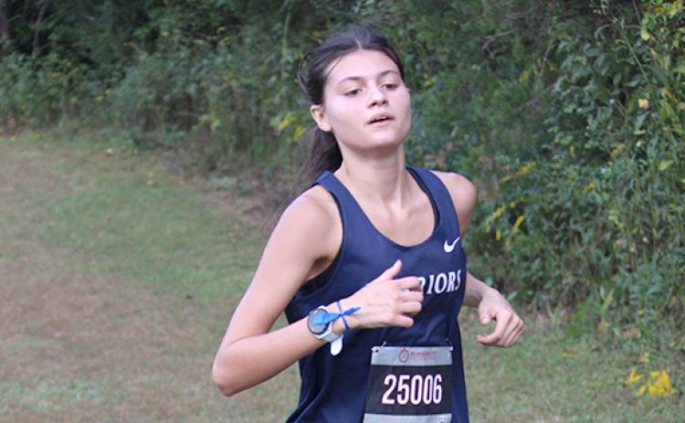 Julie Black was top finisher at the state meet, posting fourh place finish in the girl's race. (Photo/Mark Turner)