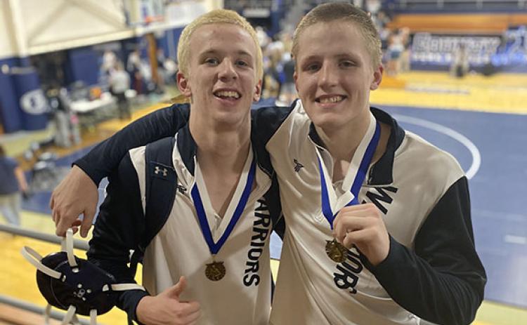 Alex Johnson, left, and Bryson Howe won individual titles at the Granite City Scramble last weekend in Elberton. (Photo/WCHS Wrestling)