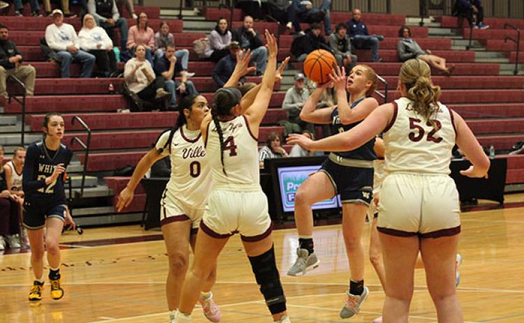 Ella Kate Shedd puts up a shot during the first half of the region game last week against Dawson County. (Photo/Mark Turner)