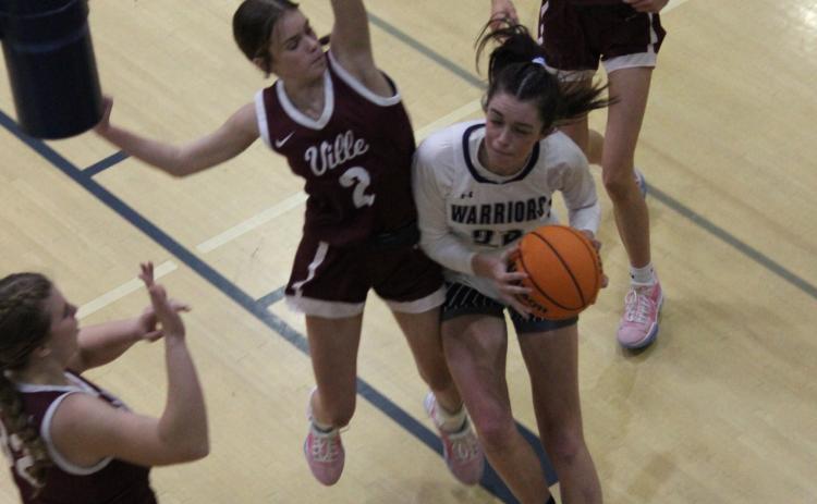 Kylie Watkins looks to score in the low post during the matchup with Dawson County.  (Photos/Mark Turner)