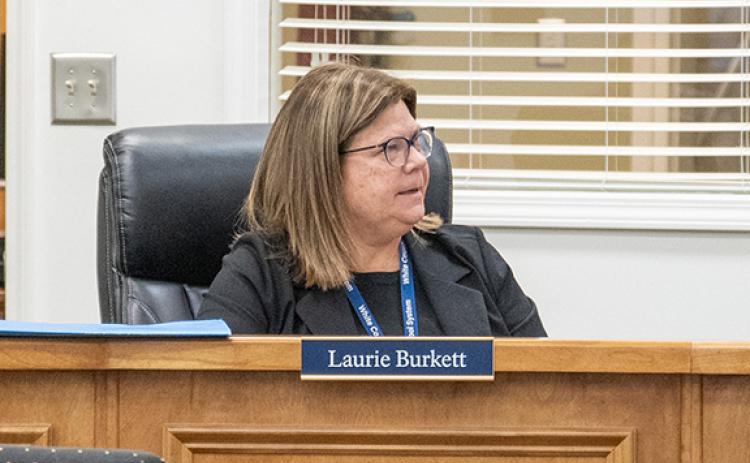 White County Superintendent Dr. Laurie Burkett listens intently to Assistant Superintendent Dr. Jonathan Stribling’s presentation. (Photo/Zach Taylor)