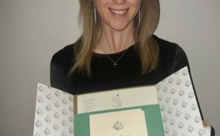 Catie Craig shows off the Augusta National invitation. (Photo/Submitted)