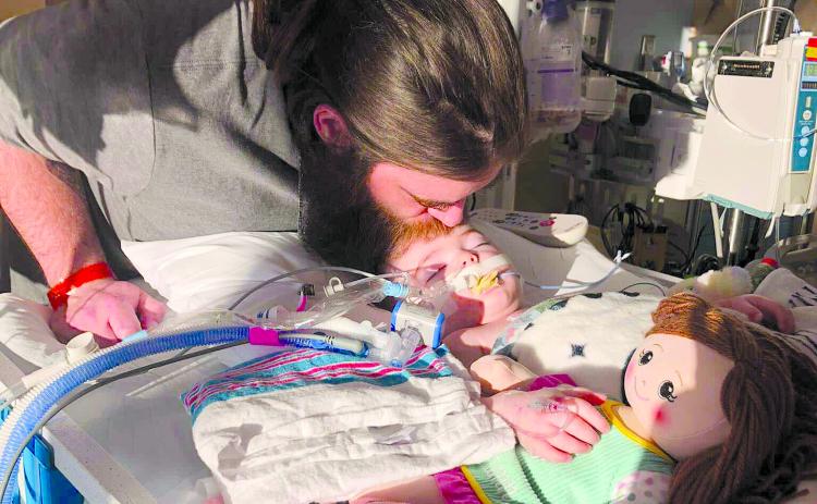 Aurelia Day after the accident, fighting for her life with her mother, Hanna Day, by her side. (Photo/Submitted)