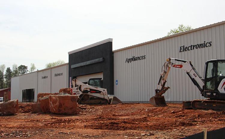 Construction has begun on the former Badcock Furniture store to turn it into the second location for Wood's Mercantile. (Photo/Denise Etheridge)