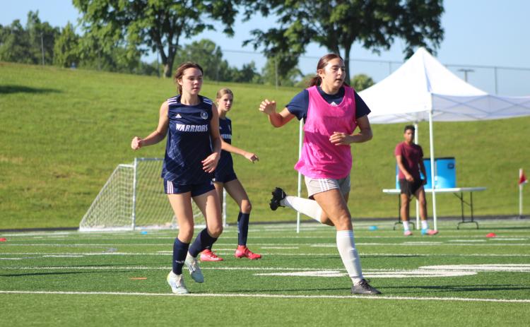 The Lady Warriors have been working hard this summer. (Photo/Mark Turner)
