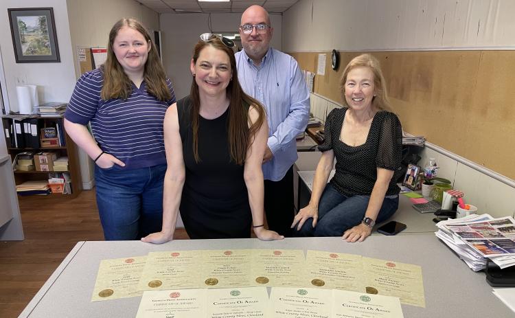 Editorial award winners (left to right) Hannah Caudell, Samantha Sinclair, Mark Turner, and Linda Erbele. (Photo/Jerry Grillo)