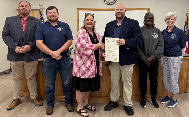 The Cleveland City Council proclaimed Sunday Nov. 2 as Retired Educators Day at its Oct. 20 meeting. From left are commissioners CJ McDonald and Jeremy McClure, retired teacher Debbie Petty, Mayor Josh Turner, commissioners Annie Sutton and Nan Bowen (also a retired educator). LINDA ERBELE/WCN