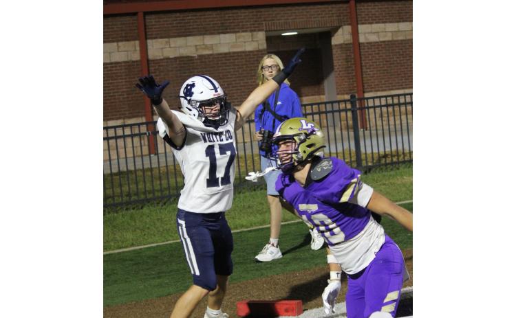 Carrson Ward celebrates after knocking away a pass in the end zone late in the first half. MARK TURNER/WCN