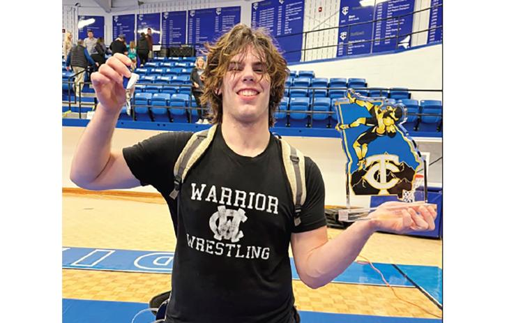 Connor Armstrong shows off his hardware after winning the 215-pound title and being named the Most Outstanding Wrestler the King of the Mountain tournament. WCHS WRESTLING/SPECIAL