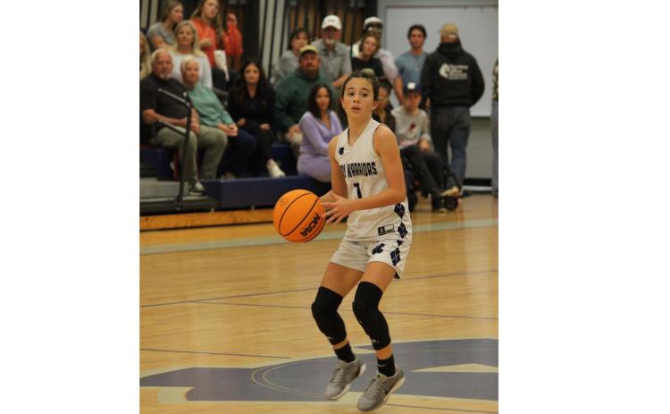 Bentley Allison makes a pass during the seventh grade game last Tuesday. MARK TURNER/WCN
