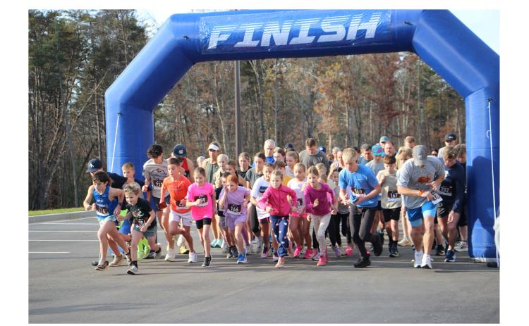 Runners aged 7 to 82 take off from the starting line at the inaugural White County Turkey Trot. PHOTOS BY CARLY HENDERSON/WCN.