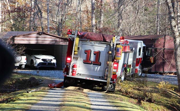 fire truck is parked outside a home on Fieldstone Road in Cleveland Tuesday morning. CARLY HENDERSON/WCN