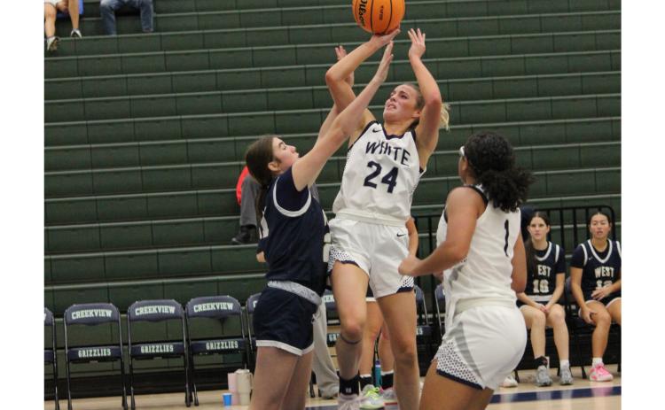 Aslyn Burkett, shown in an early season game, had 23 points in the win over Jefferson. MARK TURNER/WCN