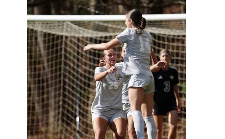 The Lady Bears, including Ariana Marfell, No. 26, and Isabella Hodson, No. 14, shown during an NAIA tournament game.