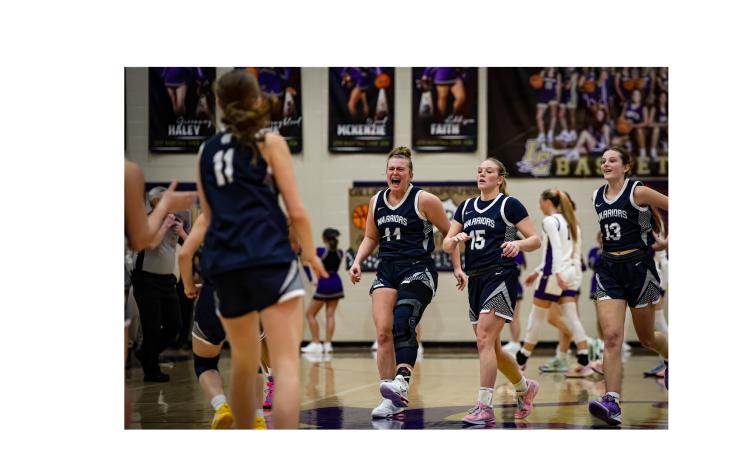 Zara Gosse celebrates after scoring in the final six seconds to lift the Lady Warriors to a 40-39 win over Lumpkin County Tuesday night in Dahlonega.  JENNIFER KNIGHT/SPECIAL