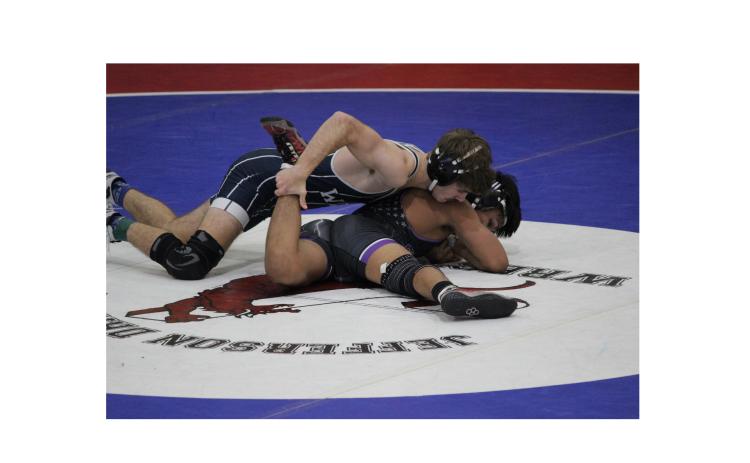 Clay Christopher won all six of his matches during the Class AAA tournament, helping the Warriors earn their first-ever Top 4 finish in the duals event. MARK TURNER/WCN