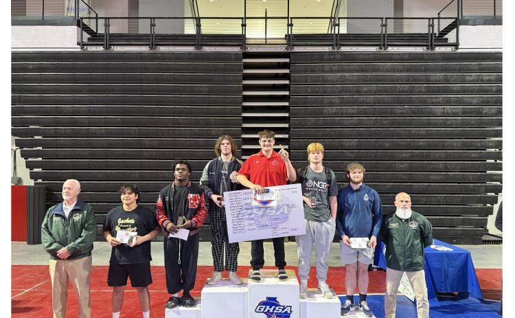 WCHS senior Connor Armstrong, left of center, finished second in the 215-pound division. WCHS WRESTLING/SPECIAL