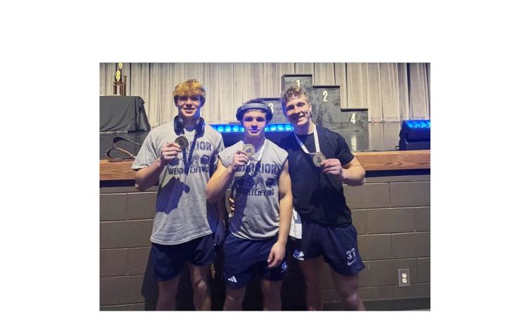Zach Godfrey,left, Jack Clark and Easton Drew all won state titles at the GACA state weight lifting event last weekend in Heard County. WCHS FOOTBALL/SPECIAL