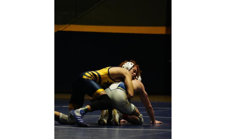 Tyler Ramos, top, was the runner-up at 125 pounds at the AAC tournament. TMU ATHLETICS/SPECIAL