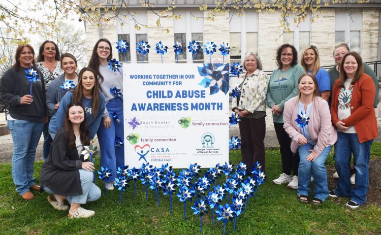 April is Child Abuse Prevention Month. On Monday, representatives from the Child Advocacy Center, White County Family Connection, Division of Family and Children’s Services (DFACS) and Enotah Court Appointed Special Advocates (CASA) planted pinwheels in front of the White County Courthouse in Cleveland.  The pinwheels symbolize the carefree childhood that every child deserves. The sign promotes child advocacy and support for families this month.  DENISE ETHERIDGE/WCN
