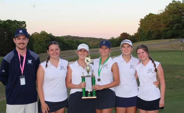 The Lady Warriors show off the Area 3 team trophy folliwing the tourament Monday at Chestatee Golf Club In Dawsonville. Show are, from left, WCHS head coach William Bagwell, Addison Schindler, Emma Rogers, Maddie Kate Hall, Lily Ellis and Annabelle Head.  WCHS GOLF/SPECIAL