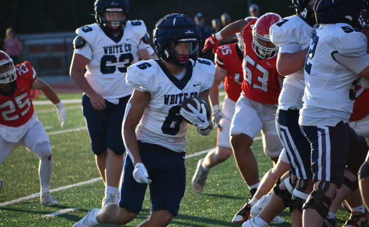 Savion Anderon looks for some running room during the preseason scrimmage last week at Rabun County. WESLEY BRANC/CLAYTON TRIBUNE